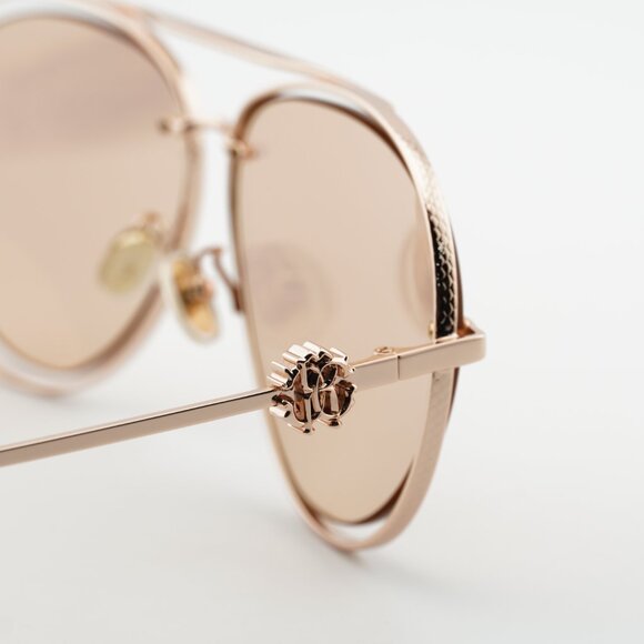 Roberto Cavalli SRC032M 8FCG Sunglasses Gold Aviator Frame, Orange Lenses